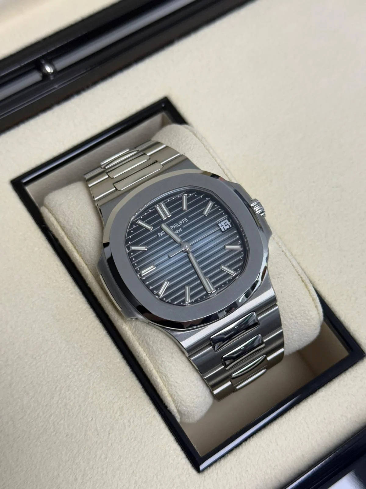 Patek Philippe Nautilus in steel presented in its case for inspection - watch authentication Australia